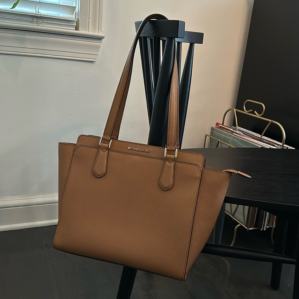 Michael Kors camel tote/shoulder bag. Great pockets and top zipper for security.